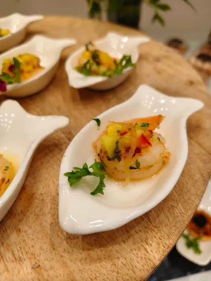 A chef’s kiss of balance. Tender prawn crowned with a bright tropical salsa that brings the freshness of herbs to every bite. Fine dining, one spoon at a time.