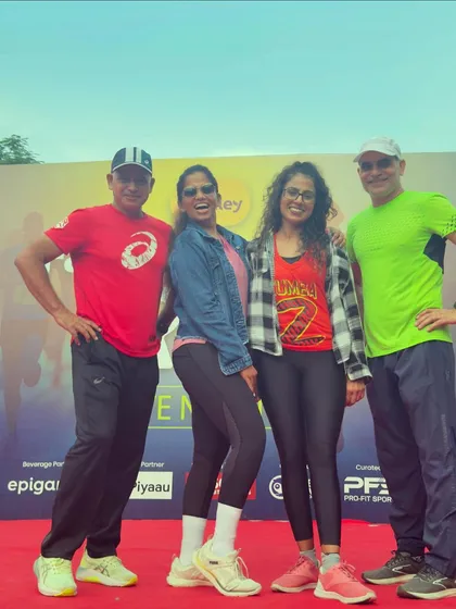 Posing with the event team on the red carpet stage at the Farmley Snack Run. Professionalism and fun go hand in hand.