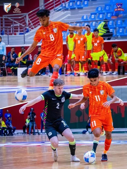 Taking on the world's best. Here are our players in a high-intensity clash against Australia during the AFC Futsal Asian Cup Qualifiers, showcasing their skill and fearlessness.