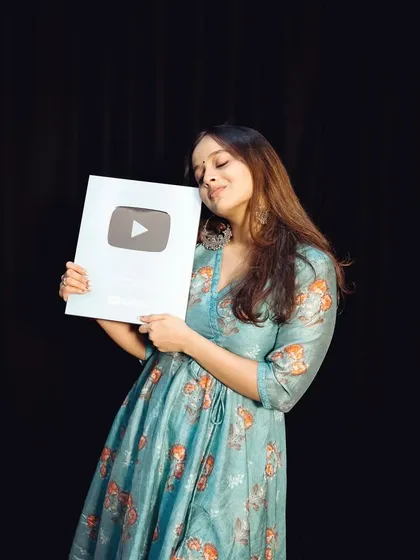 Our co-founder Mitali sharing a happy moment with our YouTube Silver Play Button. Every like, comment, and subscription helped us get here, and we are so incredibly grateful.