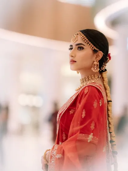 An artistic side profile, with a soft focus that adds a dreamy quality to the look.