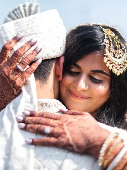 This is the "real" in "Raw. Real. Intimate." A simple, heartfelt hug between the bride and groom, full of emotion and connection. These are the moments I live to capture.