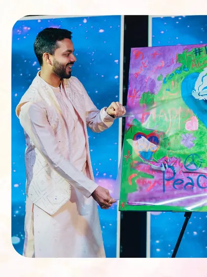 We organized a 'Wow Magic Portrait' session where the couple painted on a canvas, which was then magically transformed to reveal their portrait. It's a unique and interactive performance piece.