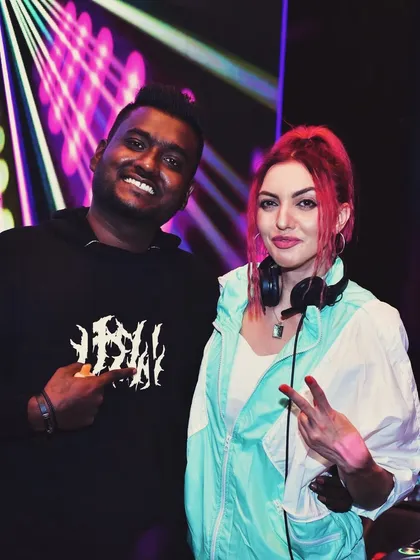 This is why I love what I do. Here I am with my student, DJ Kousi, at Loft38. My mentorship program is designed to take you from the studio to the club, and I'm proud to see my students succeed.