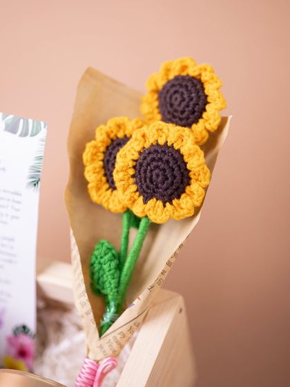 Another look at the beautiful, handcrafted crochet sunflowers, which add a touch of handmade charm and everlasting beauty.