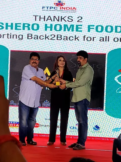 Another moment from the FTPC Awards, an event we proudly supported. Our presence at such events reinforces our brand's commitment to celebrating achievement and associating with icons who inspire others, just as our Sheros do.