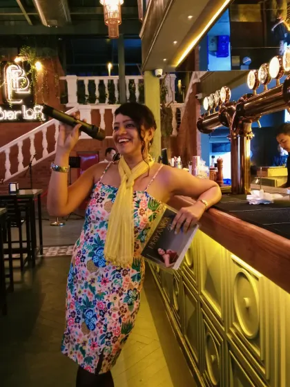Hosting a karaoke open mic night at a popular restaurant in Electronic City. I create a fun and encouraging space for people to sing their hearts out.