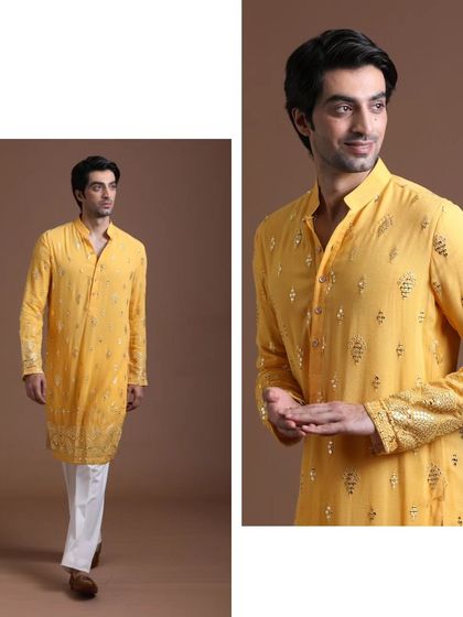 A side-by-side view of the yellow embroidered kurta, showing its elegant flow and detailed craftsmanship. A perfect example of sophistication in ethnic wear.