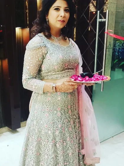 A graceful pose from a client in the mint green lehenga. It’s a popular rental choice for its subtle colors and intricate work.