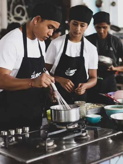 Serious about a culinary career? Our professional programs at the Domlur academy offer intensive, hands-on training in a real-world kitchen environment, guided by expert chefs.