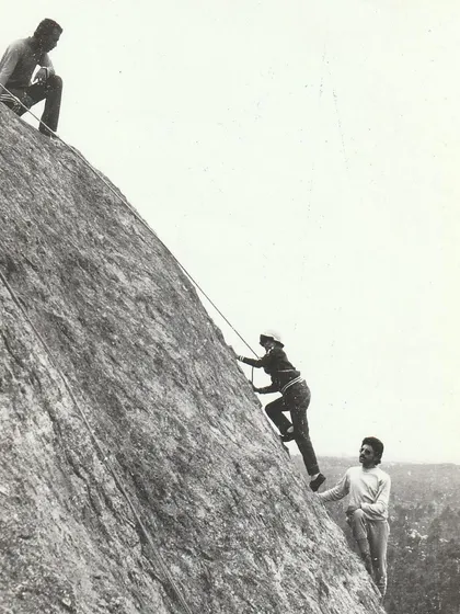 A black and white photo from the 1980s showing a climbing session at Turahalli. This captures the early days of technical climbing in Bangalore.