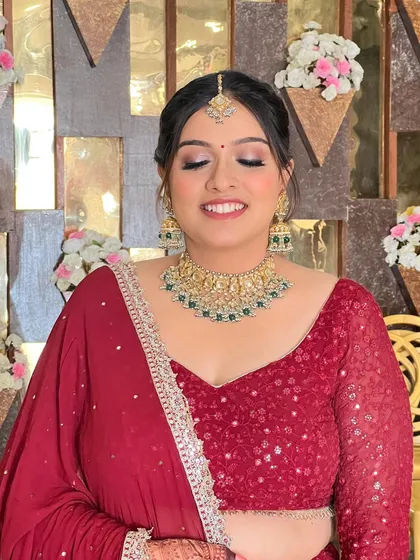 A happy, smiling shot of this client, her makeup looking radiant.