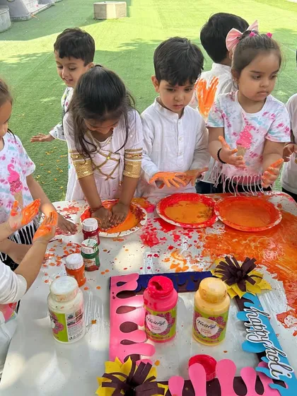 A beautiful moment of shared creativity during our Holi celebrations. The children work together, painting and playing, embodying the spirit of togetherness that the festival represents.
