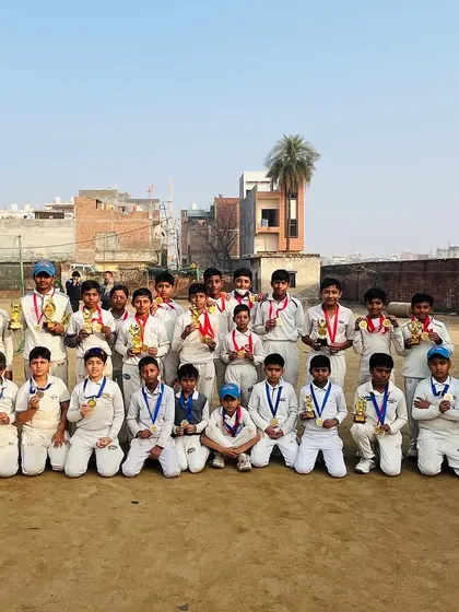 Our Sawariya juniors team posing with their medals and trophies after a successful tournament.