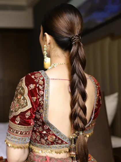 A sleek and modern bridal braid. This is a fantastic alternative to a bun for a bride who wants a more contemporary look for her wedding day.