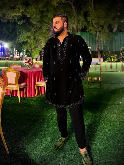 Proof that bespoke footwear can be both bold and sophisticated. Here, I designed a pair of striking olive green loafers to complete a client's elegant black embroidered kurta set. The unexpected pop of color elevates the entire look, making it a perfect example of how the right shoes can define your personal style for festive or evening events.