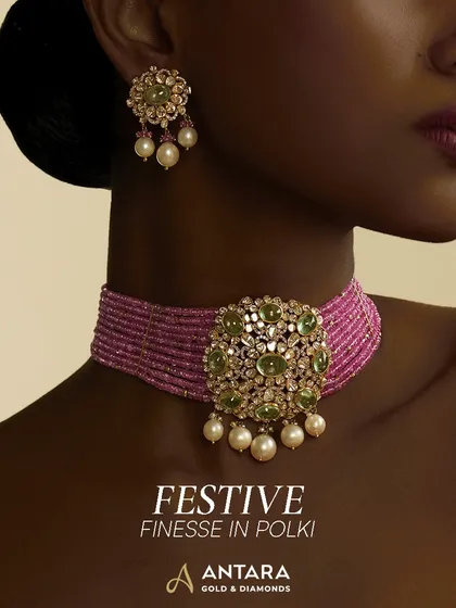 I love bringing festive energy to heirloom designs. This vivid pink beaded choker is crowned with a floral Polki medallion, green cabochons, and soft pearl drops, creating a piece that feels both traditional and vibrantly modern.