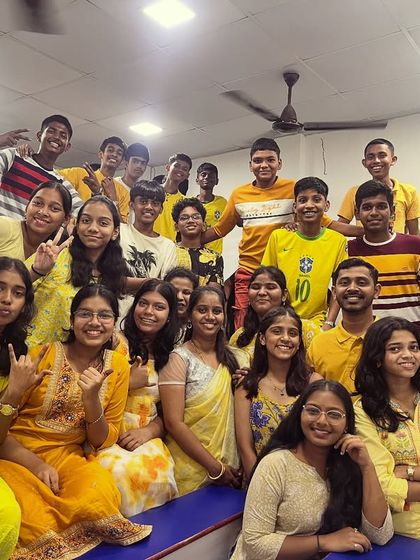 Our students posing together in their vibrant yellow attire, fully embracing the festive spirit of Navratri in the classroom.