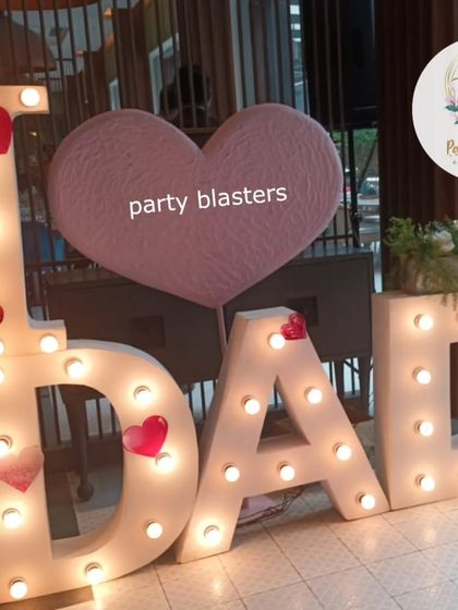 A close-up of the light-up "I ❤️ DAD" sign, a perfect centerpiece or photo prop for any Father's Day event.