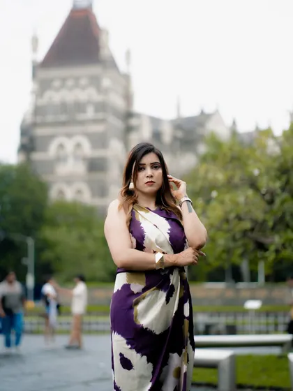 A confident, direct-to-camera pose. This type of shot is great for professional headshots or a strong portfolio image.