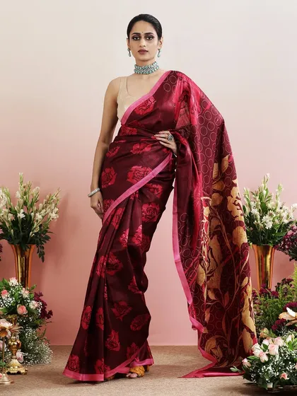 The bold floral print on this saree is sure to turn heads, making it a favorite for those who love to make a statement.