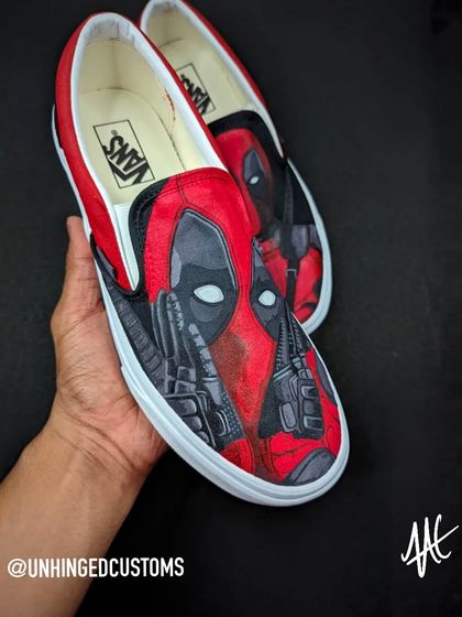 Holding up the completed Deadpool custom Vans. The red and black color scheme is classic and always looks sharp.