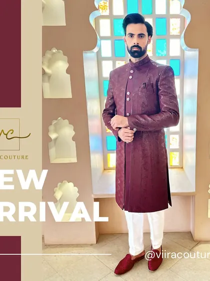 Our new arrival, a custom-tailored maroon sherwani with a textured fabric. This outfit is perfect for a groom looking for a rich, royal color for his wedding day, combining traditional style with a modern fit.