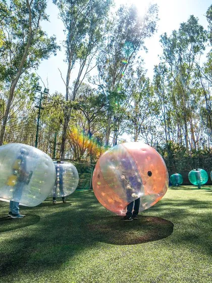 This is what pure, unadulterated fun looks like. Get your team bouncing, bumping, and rolling with a game of Bubble Soccer.