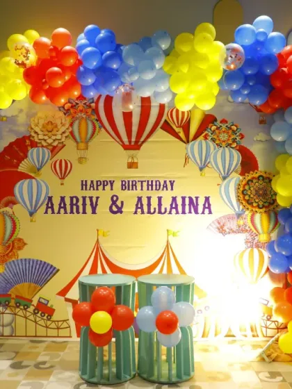 Step right up to a carnival-themed birthday! This vibrant and colorful backdrop with a Ferris wheel and hot air balloons creates a funfair atmosphere for a spectacular celebration.