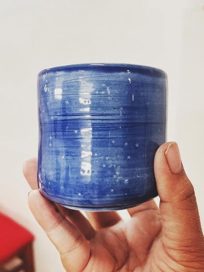 This student explored all four major techniques in her beginner's course, creating these beautiful pieces, including a delicate pierced vase and a little house luminary.