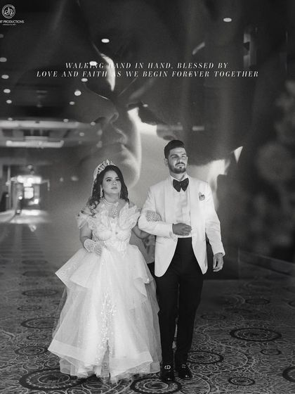 A beautiful black and white shot that feels like a movie poster. The makeup is done to define her features beautifully even in monochrome.