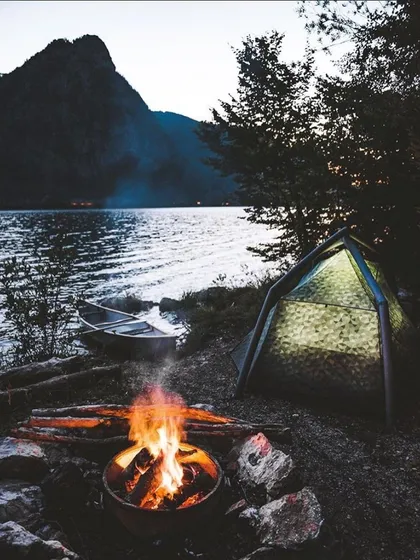 An evening at one of my favorite lakeside campsites. The setup is simple: a warm tent, a fire to keep you company, and a canoe ready for a quiet paddle on the water. This is what I mean by hitting the reset button.