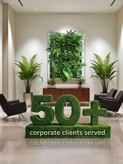 Trust is built on a track record of execution. Serving over 50 corporate clients is a testament to our ability to deliver strategic landscaping solutions that meet complex business objectives. This image from a client's lobby, featuring a vertical garden and topiary, represents our commitment to integrating brand identity with high-performance biophilic design.