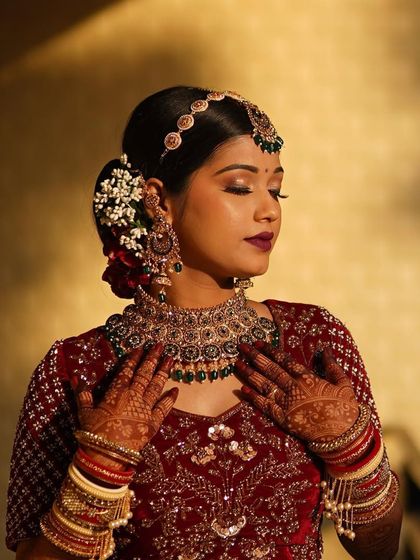 Our goal is to make you look like yourself, just more defined. Here, we achieved that with a soft, natural-looking base, glam eyes, and a bold lip for a stunning contrast.