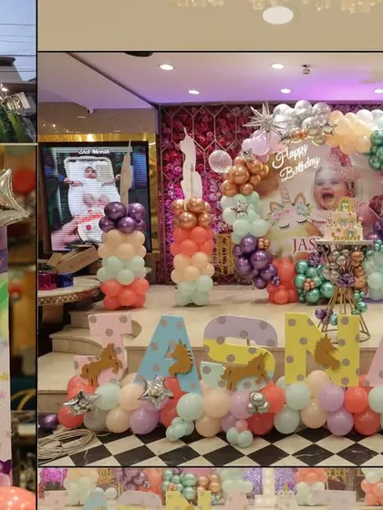 A collage showcasing the elaborate unicorn themed decorations at a first birthday party venue in Delhi, from the entrance sign to the main stage.