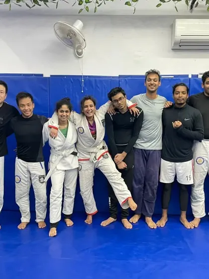 All smiles after a great roll. This is the feeling of accomplishment and camaraderie that we share at the end of every BJJ masterclass.