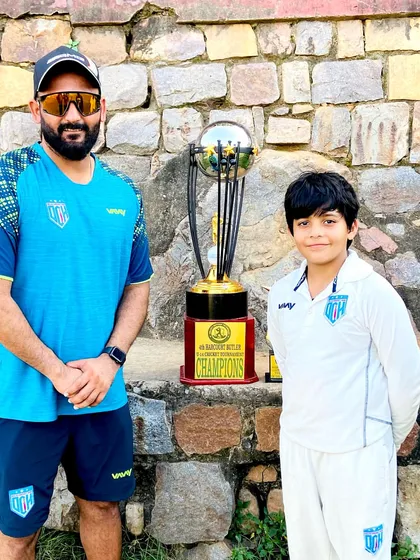 With one of our youngest champs and the trophy. We nurture talent from a very early age at DCH.