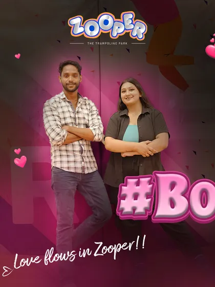 Love flows in Zooper. A couple poses for a Valentine's themed shoot, ready to take on the park together.