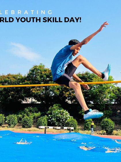 This action shot captures the peak of a high jump, showcasing the skill and athleticism our training develops.