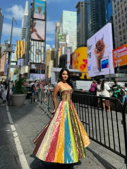 Taking Indian textiles to the global stage. This is one of my proudest creations: a custom corset dress made from upcycled Banarasi sarees for Anushka Sen, right in the heart of Times Square, New York.