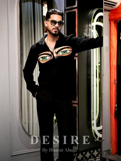 Another full-length view of the 'Haters' eyes shirt, a piece that is guaranteed to turn heads and start conversations.