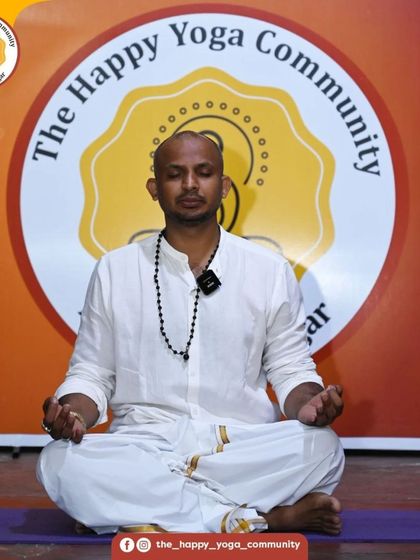 A moment of meditation during our Surya Namaskara event. Even in a large group, we find moments of inner stillness and focus.