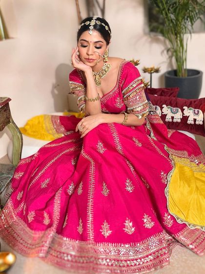 The complete look is a picture of grace and elegance, perfect for a wedding ceremony or sangeet.