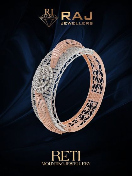 A classic bangle mounting that combines intricate filigree with a solid band structure. The central portion is designed to hold a cluster of stones, creating a timeless piece that balances delicate detail with bold presence.