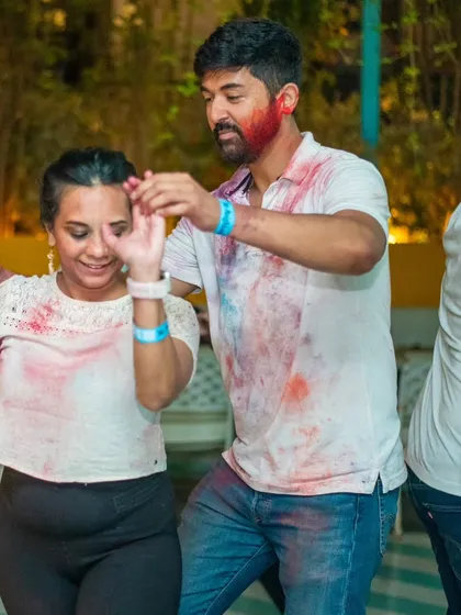 A fun moment from our Rang Barse Holi special. The white shirts were a perfect canvas for the celebration.