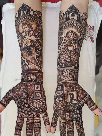 A beautiful depiction of Lord Krishna playing the flute on one arm and Radha on the other, surrounded by peacock and lotus motifs.