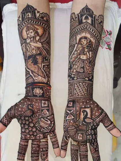 A beautiful depiction of Lord Krishna playing the flute on one arm and Radha on the other, surrounded by peacock and lotus motifs.