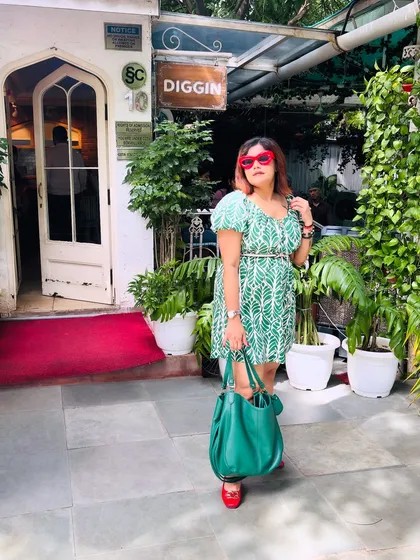 A final look at the green dress outfit, emphasizing the tote bag and overall summery vibe.