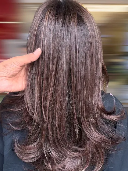 A closer look at the smokey mocha brown layers, showing the texture and subtle color variations.