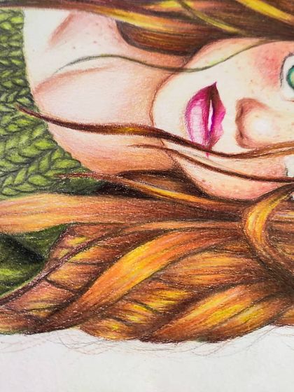 A close-up of the girl's face, showing her green eyes and freckles.